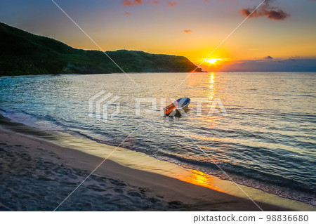 Tropical sandy beach at summer sunset in Fiji Islands, Pacific ocean 98836680
