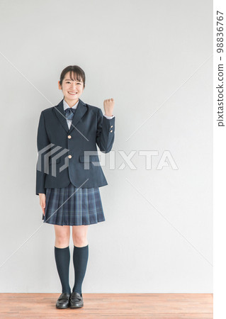 Smiling high school student, junior high school student, high school girl (uniform, school uniform, Asian) who poses in a school classroom 98836767