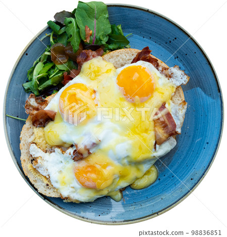 Dutch sandwich uitsmijter on white bread with fried bacon, eggs and cheese Dutch sandwich uitsmijter on white bread with fried bacon, eggs and cheese 98836851