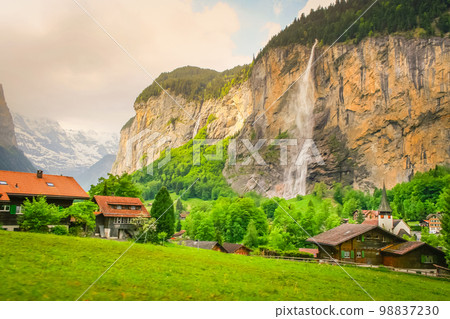 Lauterbrunnen alpine village near Interlaken in the canton of Bern, Swiss alps Lauterbrunnen alpine village near Interlaken in the canton of Bern, Swiss alps 98837230