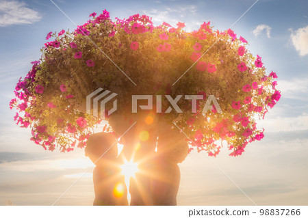 Delicate vase of flowers in a bloom, Luxembourg gardens at springtime, France Delicate vase of flowers in a bloom, Luxembourg gardens at springtime, France 98837266