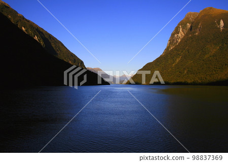 Dramatic Doubtful Sound landscape, South Island of New Zealand 98837369