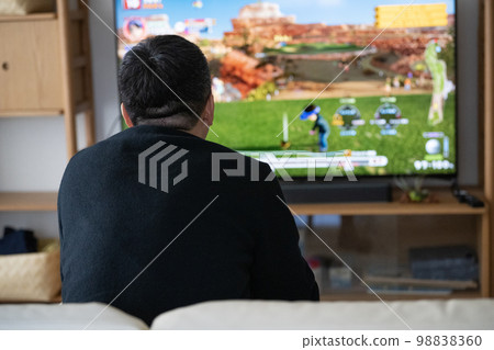 man playing video games alone 98838360