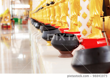 Alms on table. 98841073