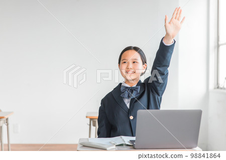 Smiling junior high school, high school, and elementary school girls (uniform) raising hands, opinions, remarks, and questions during class in school classrooms 98841864