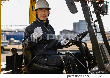 Forklift male field worker Forklift male field worker 98842180