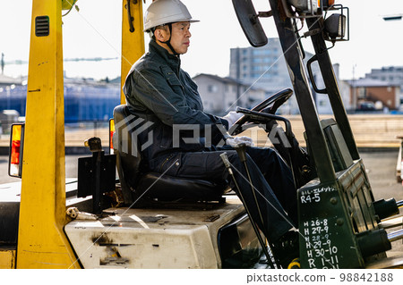 Forklift male field worker Forklift male field worker 98842188