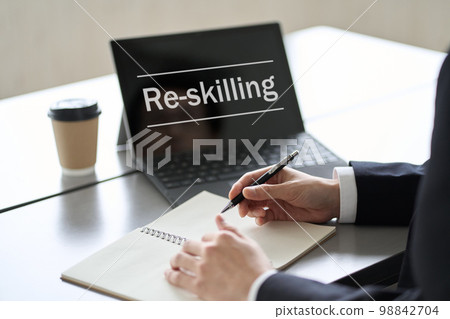 Asian businessman studying online on computer 98842704