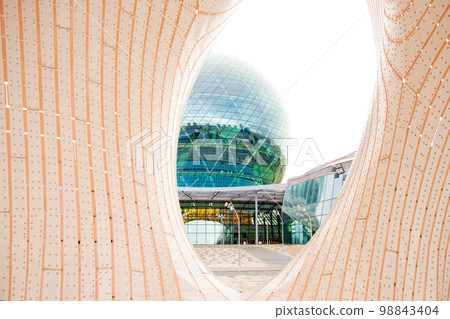 Sculpture construction Minima Maxima, Nur-Alem sphere EXPO 2017 Exhibition Area. View of museum through street installation. Astana, Kazakhstan - 10.22.2022. 98843404