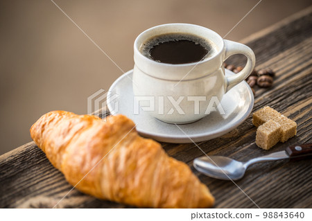 Coffee and croissant Coffee and croissant 98843640