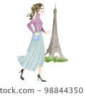 Woman walking in Paris, France 98844350