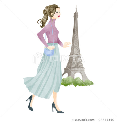 Woman walking in Paris, France 98844350