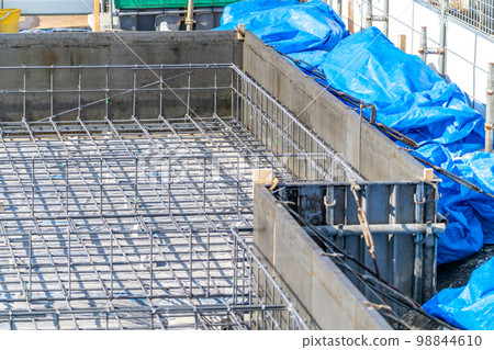 Construction site, foundation work, reinforcement work, metal form, steel formwork 98844610