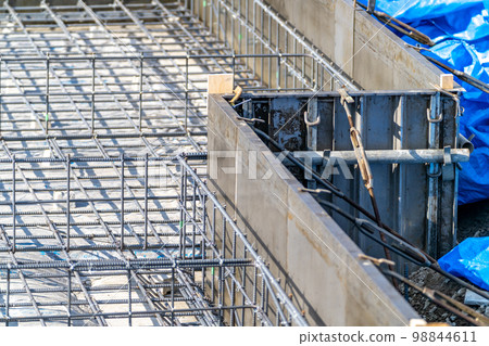 Construction site, foundation work, reinforcement work, metal form, steel formwork 98844611