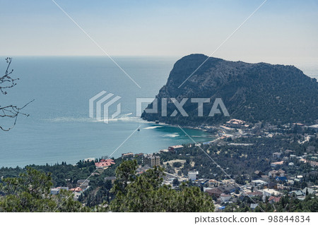 View of the resort city Novyi Svet and Green bay from trail. Crimea. 98844834