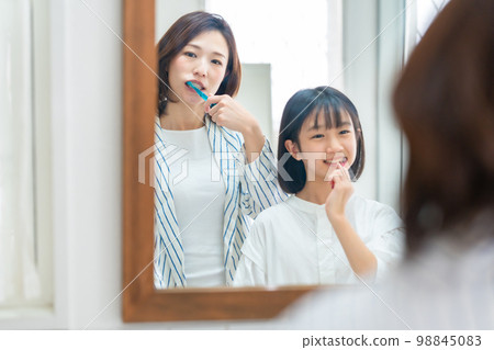 Tooth brushing, dental care, parent and child 98845083