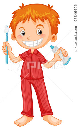 Boy in pyjamas holding toothbrush and toothpaste 98846406