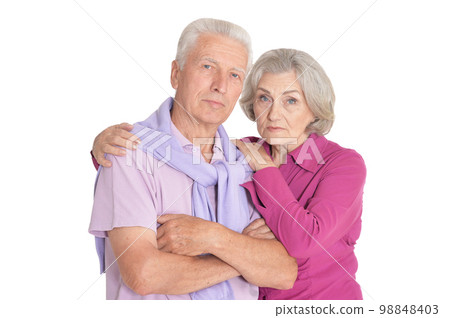 Sad senior couple isolated on white background Sad senior couple isolated on white background 98848403