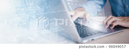 man using laptop with planning and strategy, Stock market, Business growth down, Concept of financial crisis, echnical price graph and indicator, red candlestick chart with analyzing forex trading. man using laptop with planning and strategy, Stock market, Business growth down, Concept of financial crisis, echnical price graph and indicator, red candlestick chart with analyzing forex trading. 98849057