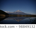 Mt.Fuji reflected in a quiet lake on a winter night 98849132