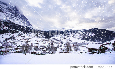 The viewpoint of the Alps Mountains in winter, Grindelwald Switzerland. Swiss ski Alpine mountain resort with famous Eiger, Monch and Jungfrau mountain, Grindelwald, Berner Oberland,. The viewpoint of the Alps Mountains in winter, Grindelwald Switzerland. Swiss ski Alpine mountain resort with famous Eiger, Monch and Jungfrau mountain, Grindelwald, Berner Oberland,. 98849277