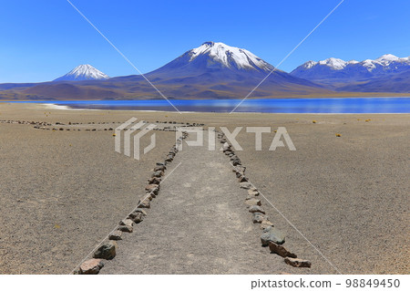 Valley of the Moon and lake, Atacama Desert dramatic landscape, Chile 98849450