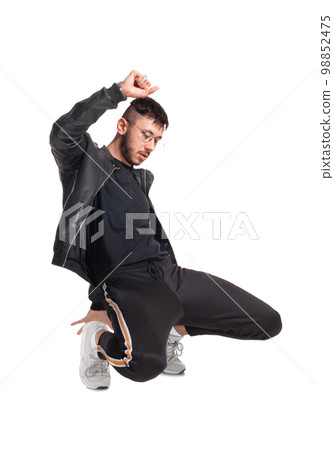 Full-length photo of a funny guy dancing in studio isolated on white background. 98852475