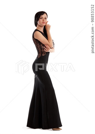 Full length portrait of a fashion model girl isolated on white background. 98853152