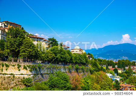 Street view of Bergamo old town, italian city northeast of Milan, in the Lombardy region . Street view of Bergamo old town, italian city northeast of Milan, in the Lombardy region . 98854604