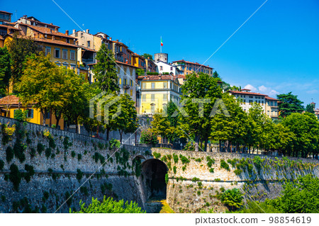 Street view of Bergamo old town, italian city northeast of Milan, in the Lombardy region . Street view of Bergamo old town, italian city northeast of Milan, in the Lombardy region . 98854619