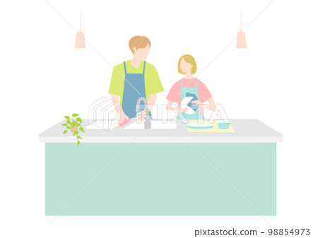 Two people clearing dishes in the kitchen Two people clearing dishes in the kitchen 98854973