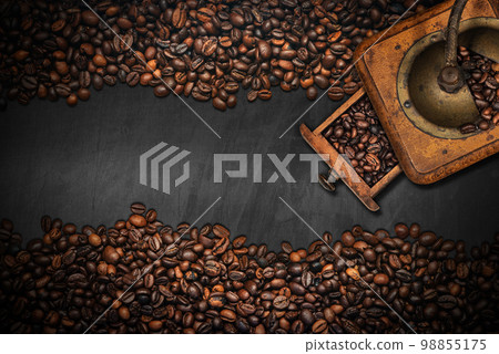 Large Group of Roasted Coffee Beans on a Blackboard with Copy Space Large Group of Roasted Coffee Beans on a Blackboard with Copy Space 98855175