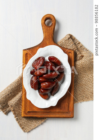 Concept of tasty food, dates, top view 98856182