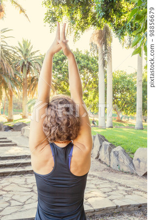 Girl making yoga 98856679