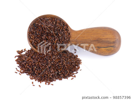 Psyllium seeds in wooden spoon, isolated on white background. Plantain. Plantago psyllium. Psyllium seeds in wooden spoon, isolated on white background. Plantain. Plantago psyllium. 98857396