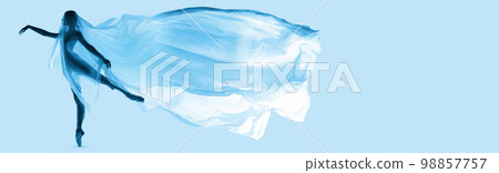 Graceful woman, beautiful ballerina dancing, performing with transparent fabric over light blue background in neon. Banner 98857757
