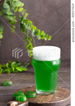 Saint Patrick Day beer on black background Saint Patrick Day beer on black background 98857824