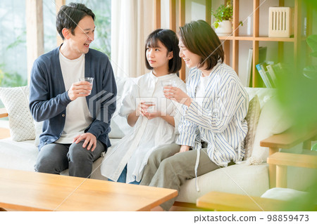 family drinking delicious water family drinking delicious water 98859473