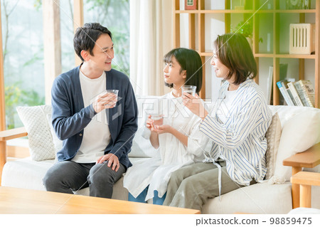 family drinking delicious water family drinking delicious water 98859475