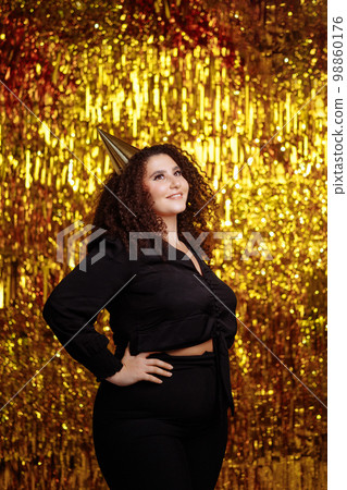 Girl with a curly hairstyle Girl with a curly hairstyle 98860176
