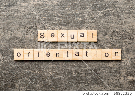 Sexual orientation word written on wood block. Sexual orientation text on cement table for your desing, concept 98862330