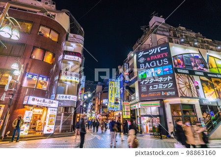 The cityscape of Tokyo in Japan, overlooking the west exit of Ikebukuro Station, Chuo-dori, West 1st Avenue, etc. 98863160