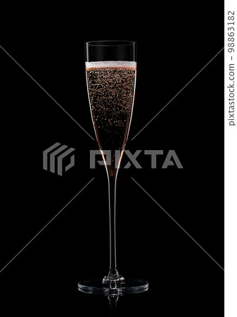 Luxury crystal glass with pink rose champagne on black. Luxury crystal glass with pink rose champagne on black. 98863182