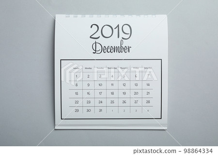 December 2019 calendar on light grey background, top view December 2019 calendar on light grey background, top view 98864334