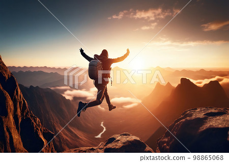 A Man Jumps Merrily in The Mountains, A Beautiful Landscape, A Happy Tourist, Hiking A Man Jumps Merrily in The Mountains, A Beautiful Landscape, A Happy Tourist, Hiking 98865068