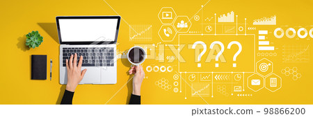 Question marks with person using laptop computer 98866200