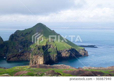 Vestmannaeyjar island beach day view, Iceland landscape. Vestmannaeyjar island beach day view, Iceland landscape. 98867940
