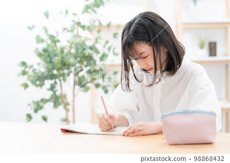 Elementary school student studying taking an exam 98868432