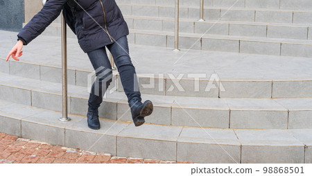 Falling Woman on Slippery Stairs, Icy Steps Fell, Unsafe Wet Steps, Slippery Stairs Problem 98868501