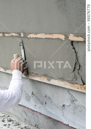Plasterer wall mortar finish 98876776